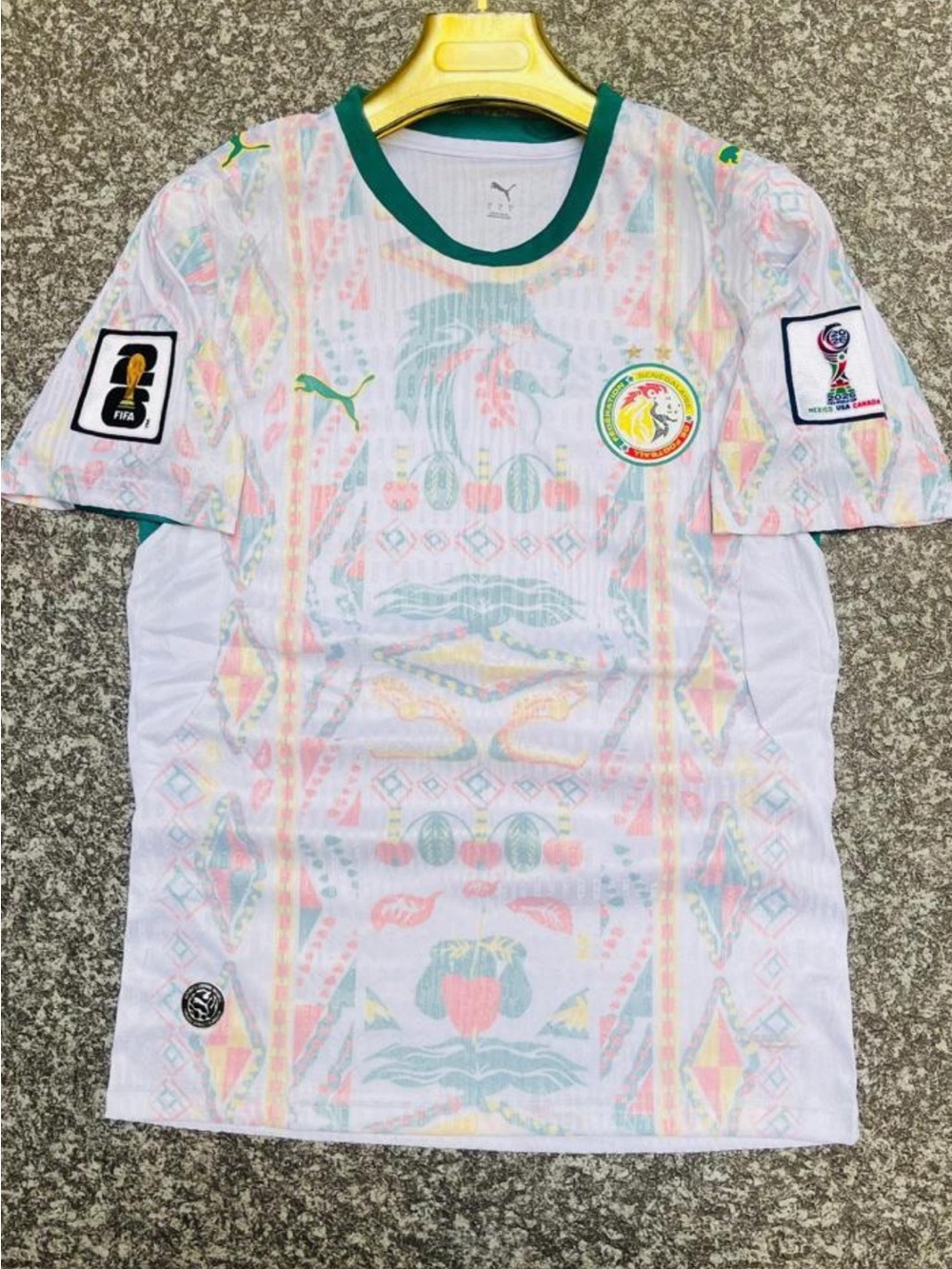 Puma White Jersey with Green Collar and Pastel Multicolor Accents